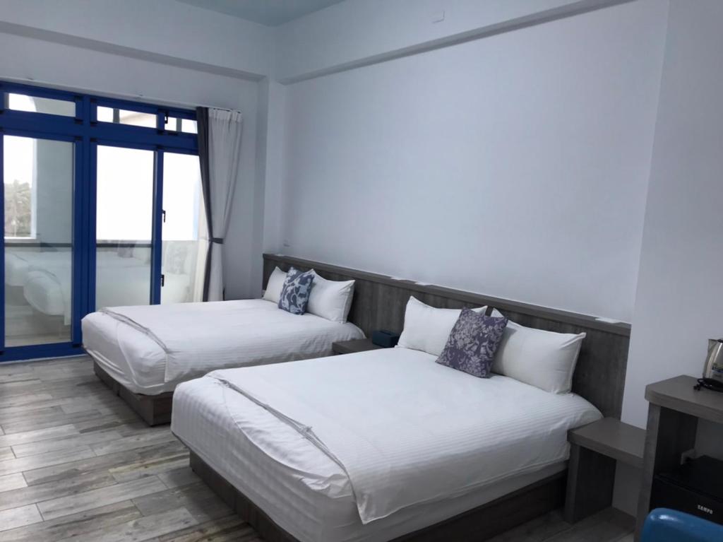 Postel nebo postele na pokoji v ubytování Memories Homestay
