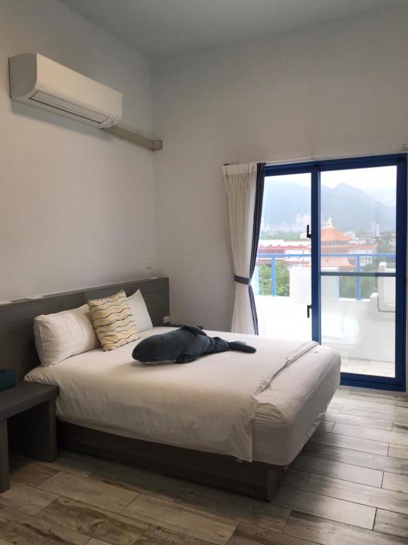 Postel nebo postele na pokoji v ubytování Memories Homestay