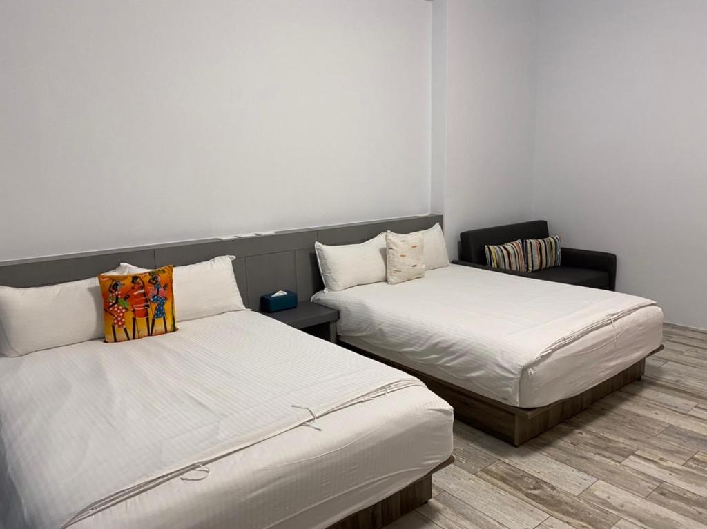 Postel nebo postele na pokoji v ubytování Memories Homestay