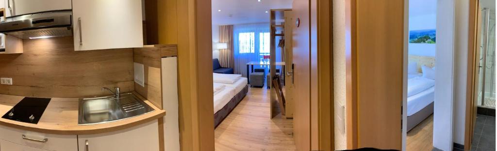 Kuchyň nebo kuchyňský kout v ubytování Alpenrose Appartements