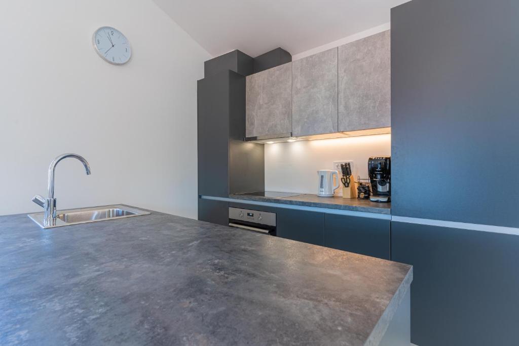 Kuchyňa alebo kuchynka v ubytovaní SUNRISE ISLAND LOFT