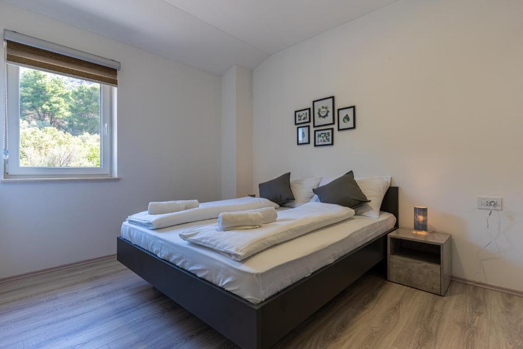 Posteľ alebo postele v izbe v ubytovaní SUNRISE ISLAND LOFT