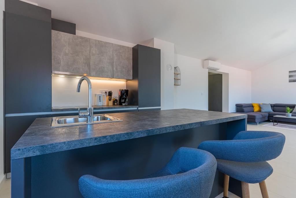 Kuchyňa alebo kuchynka v ubytovaní SUNRISE ISLAND LOFT