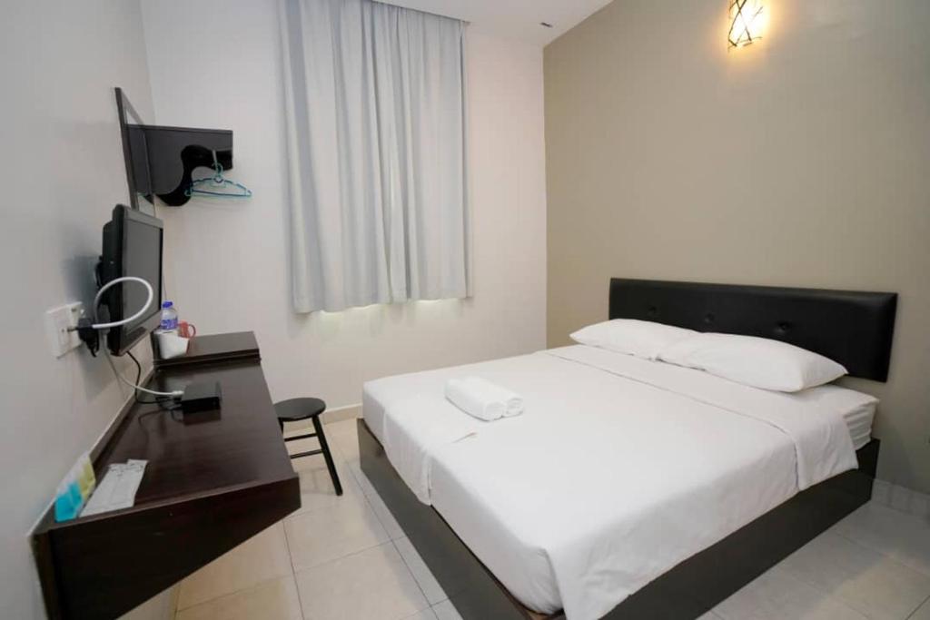 TV a/nebo společenská místnost v ubytování CK Hotel