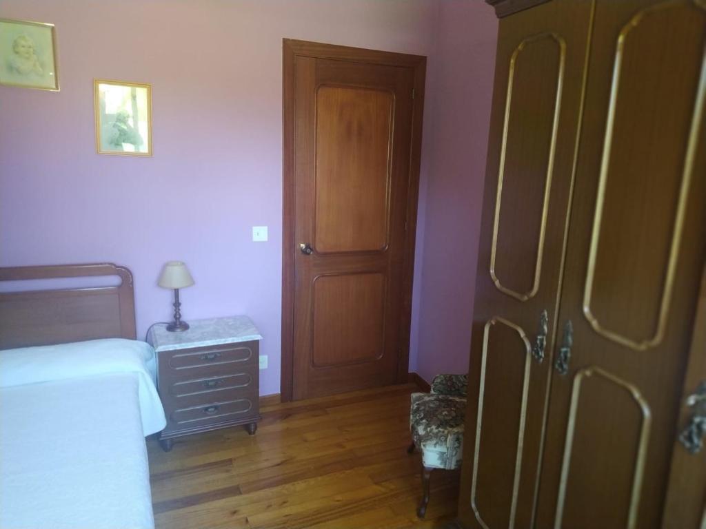 A bed or beds in a room at Casa Sopeña
