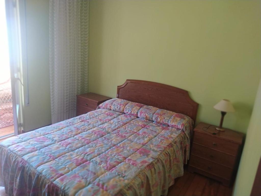 A bed or beds in a room at Casa Sopeña