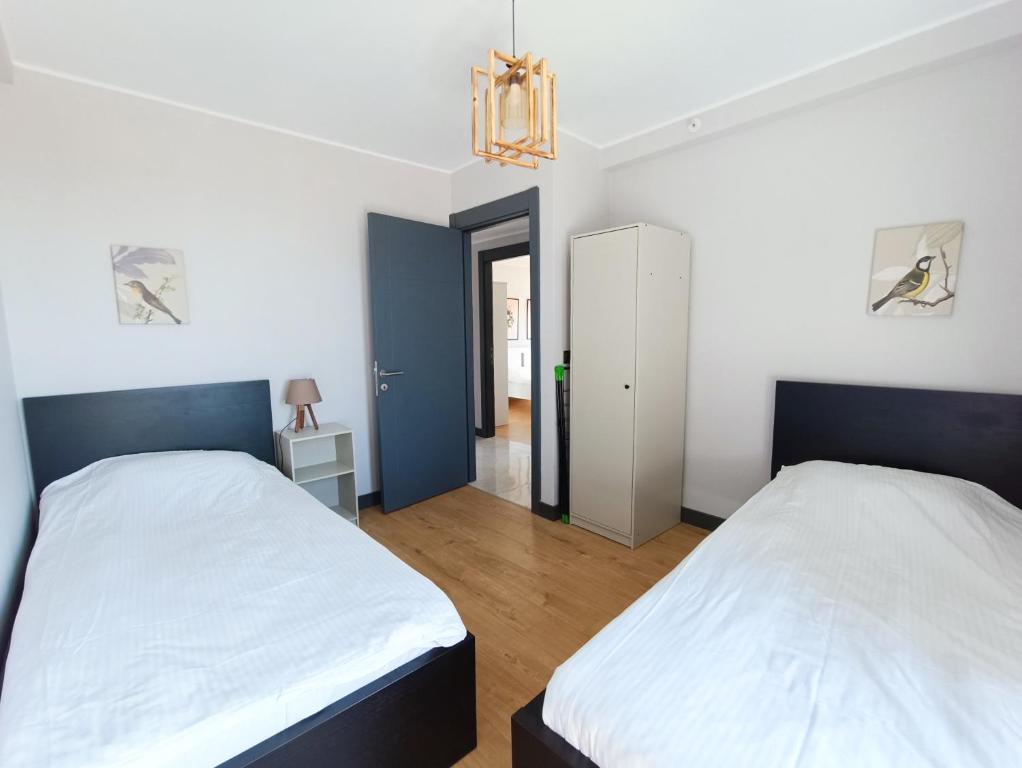 Postel nebo postele na pokoji v ubytování Luxury Fully Equipped 3BR 2BA Apartment by Siena Suites