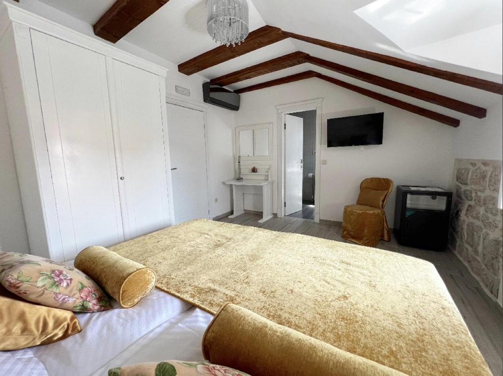 TV a/nebo společenská místnost v ubytování Bed&Breakfast Sorgo Palace