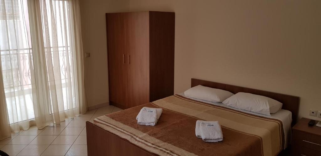 Postel nebo postele na pokoji v ubytování Anatolia Studios