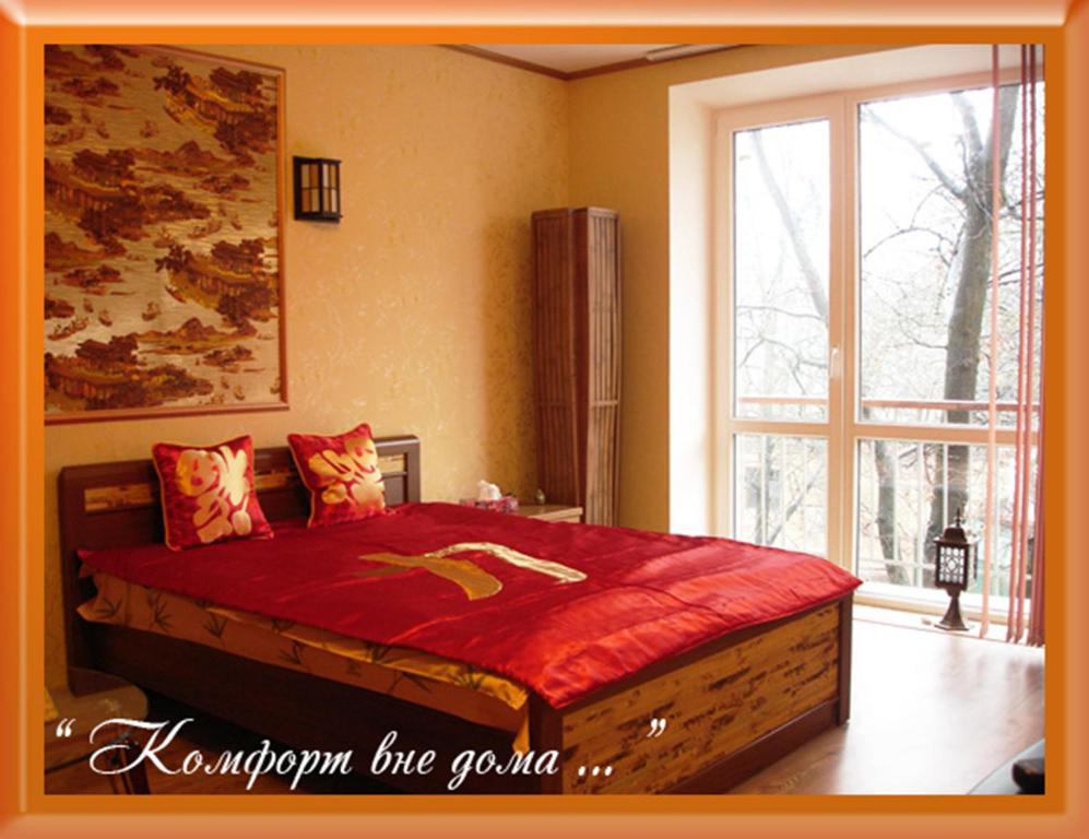Un ou plusieurs lits dans un hébergement de l'établissement Apartments Zatyshok