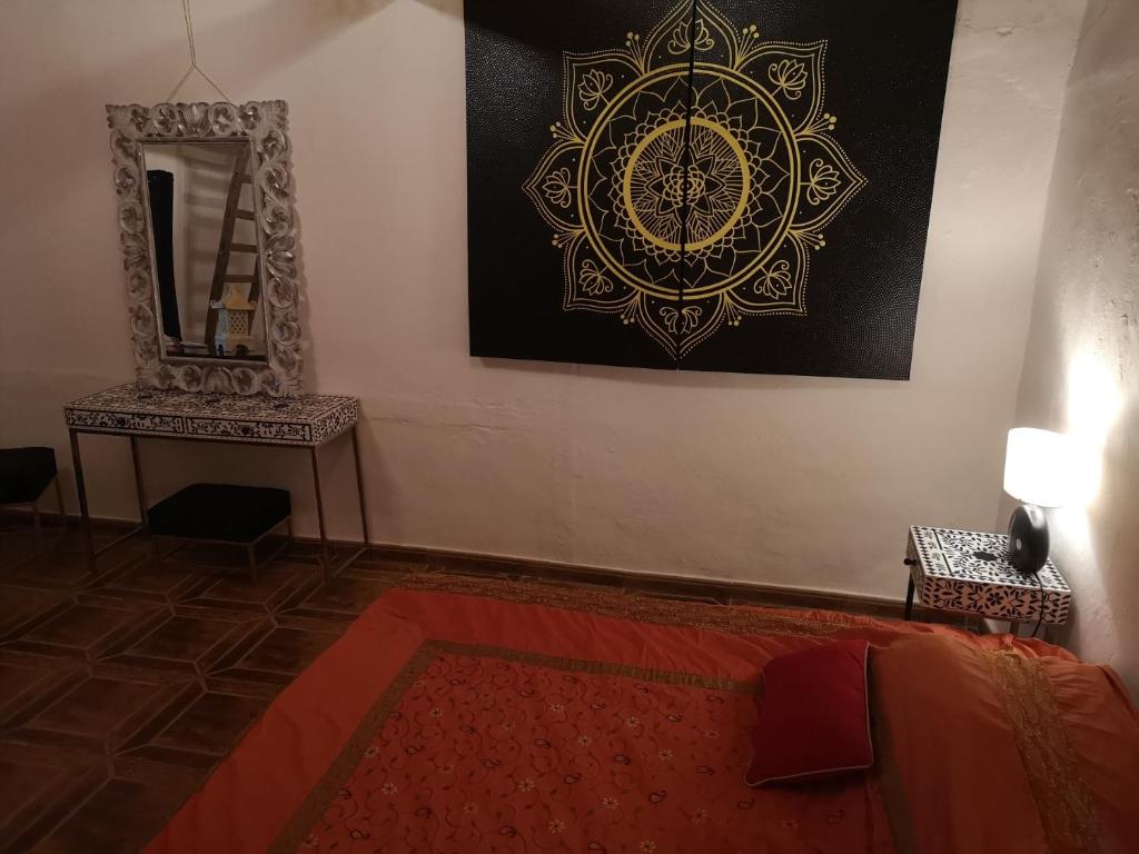Postel nebo postele na pokoji v ubytování Suite Zen y Cueva Refugio