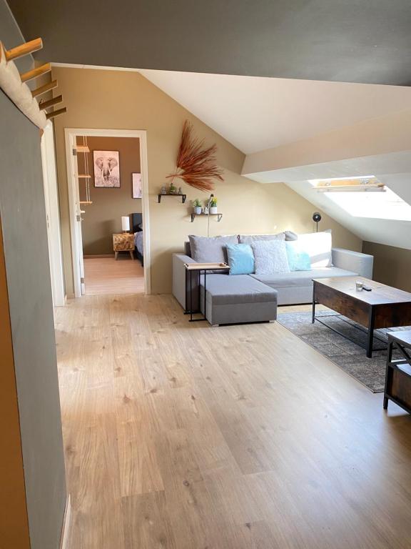 Posezení v ubytování Cosy 2-Bedroom Apartment in the center of Hotton