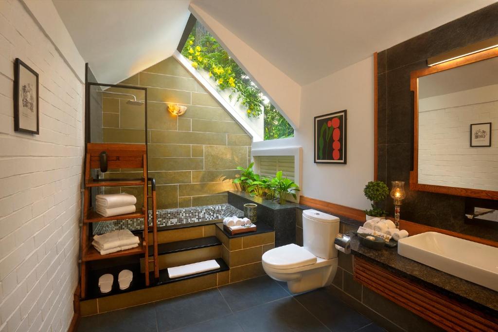 Koupelna v ubytování Amanvana Spa Resort, Coorg