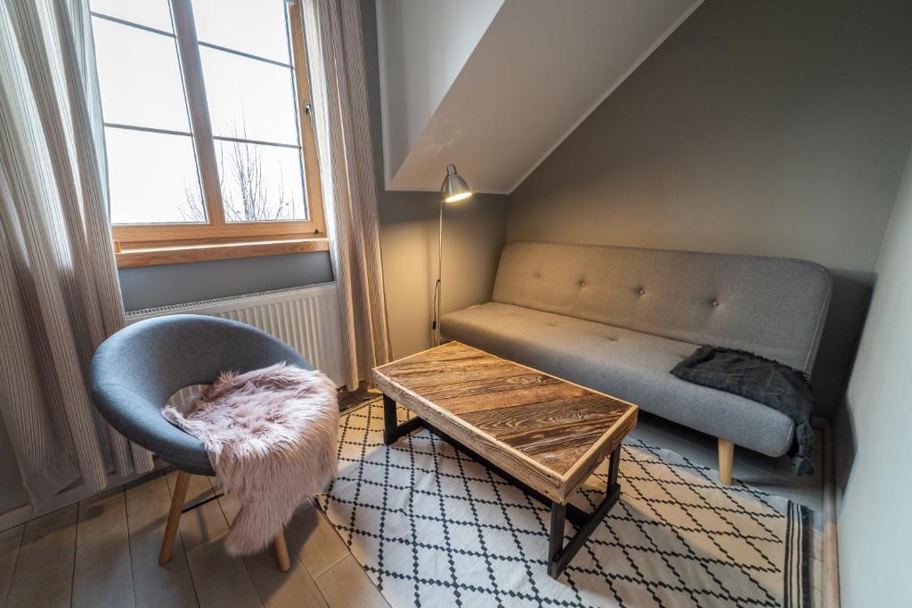 Posedenie v ubytovaní Gosciniec Szuwary