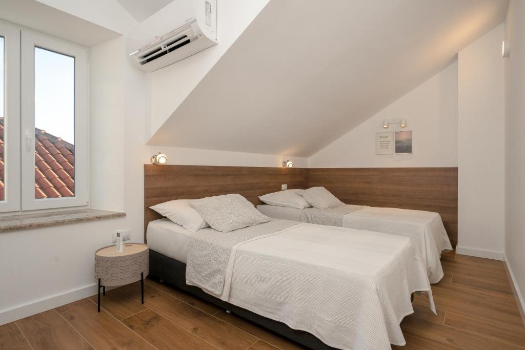 Posteľ alebo postele v izbe v ubytovaní Villa Diklic