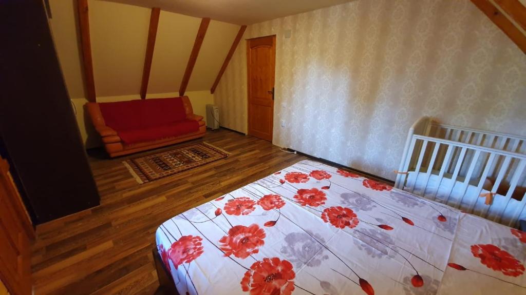 Postel nebo postele na pokoji v ubytování Casa Agapie