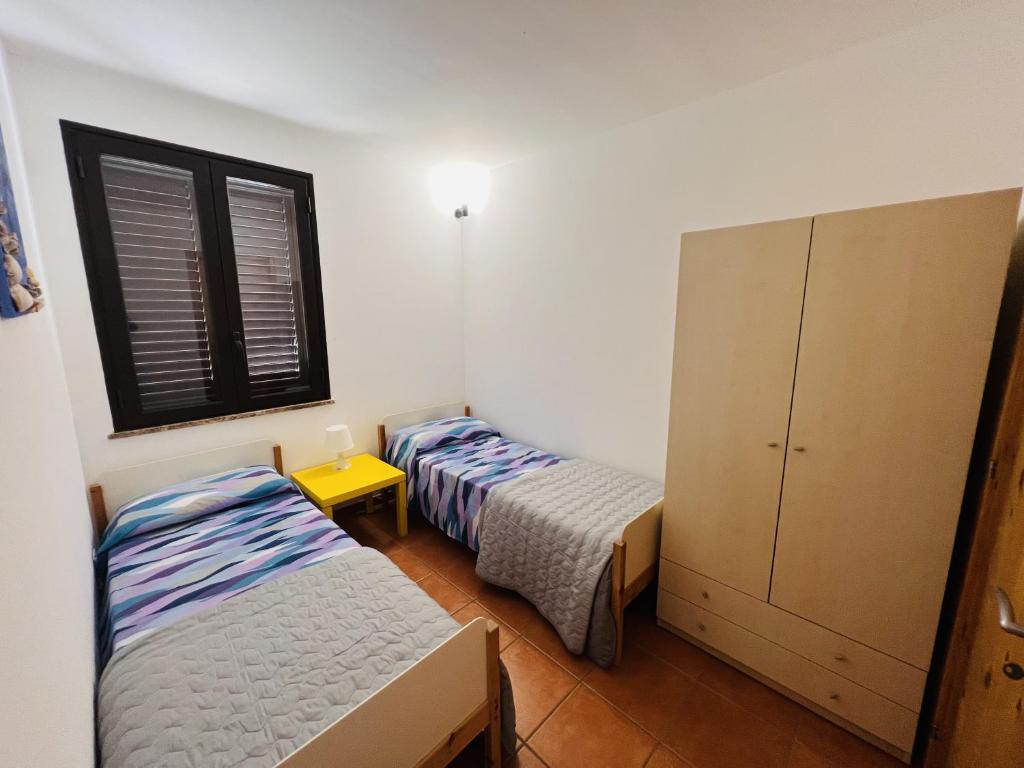 Postel nebo postele na pokoji v ubytování Casa Carolina