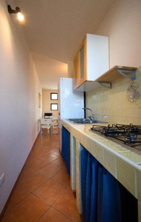 Kuchyň nebo kuchyňský kout v ubytování Casa Carolina