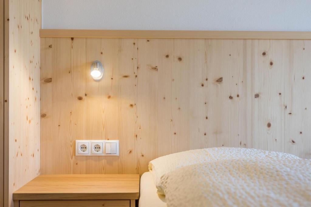 Postel nebo postele na pokoji v ubytování Thusnelda Apartment B