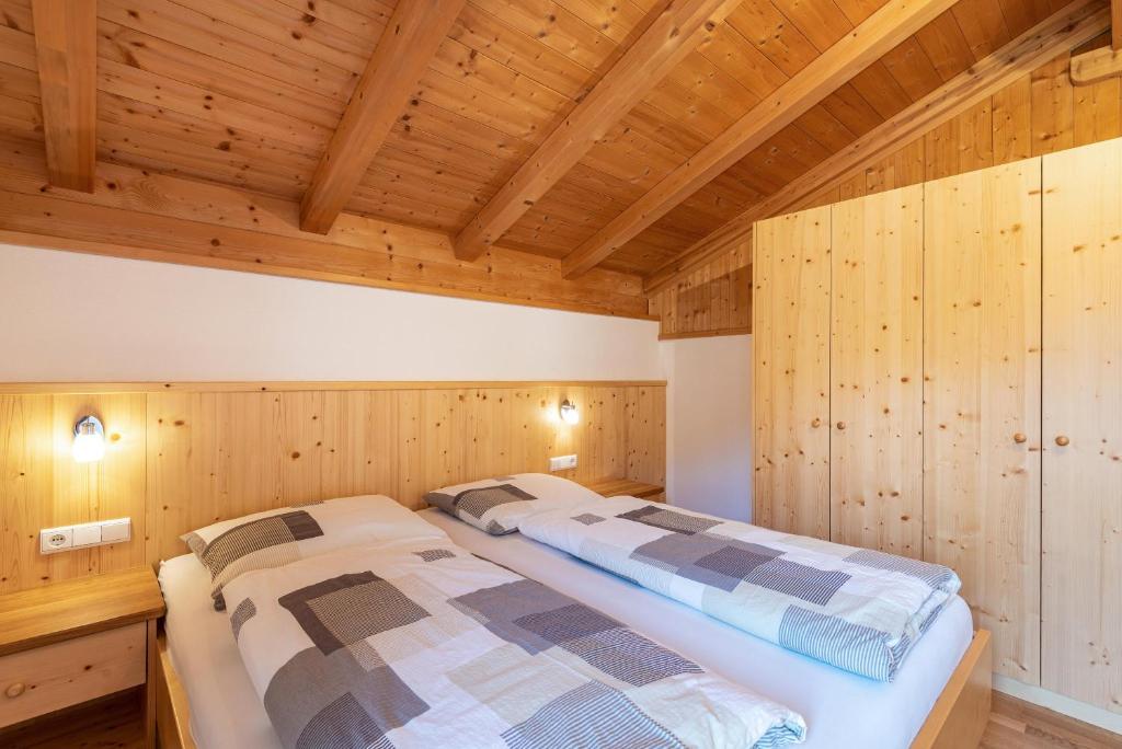 Postel nebo postele na pokoji v ubytování Thusnelda Apartment C