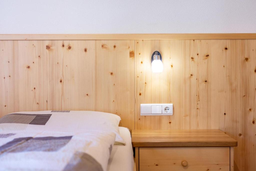 Postel nebo postele na pokoji v ubytování Thusnelda Apartment C