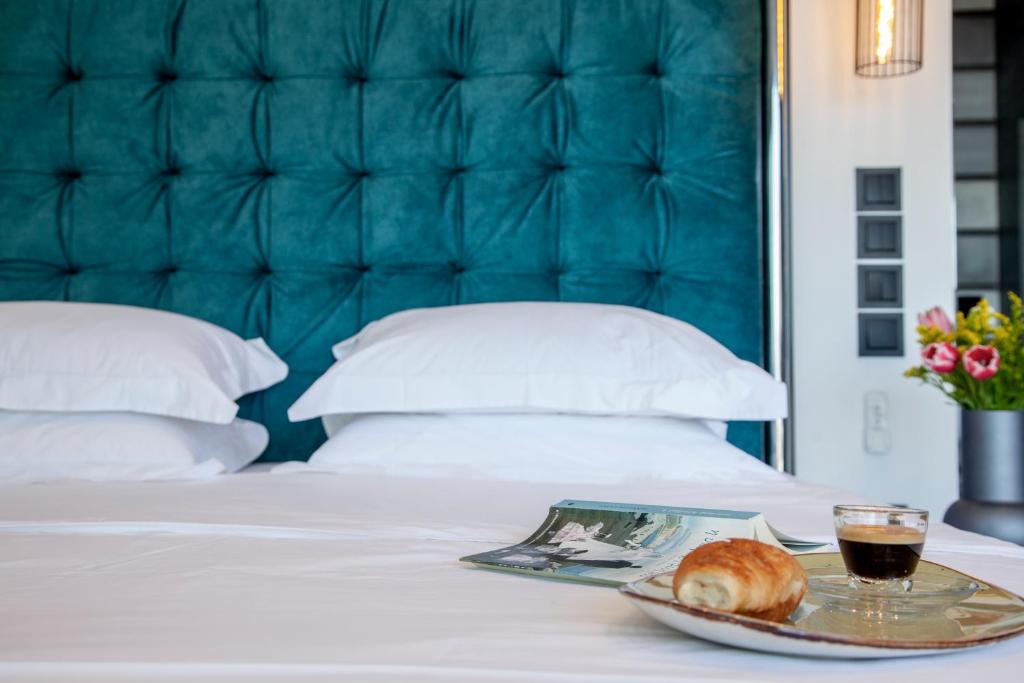 Posteľ alebo postele v izbe v ubytovaní Desun Suites