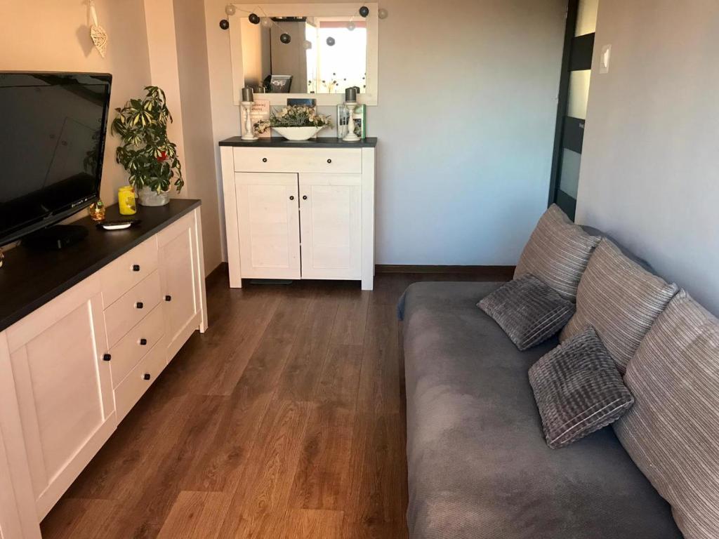 Kuchyňa alebo kuchynka v ubytovaní Apartament SŁONECZNY Mrzeżyno