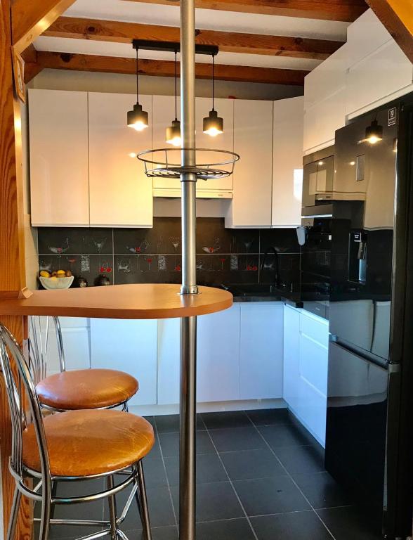 Kuchyňa alebo kuchynka v ubytovaní Apartament SŁONECZNY Mrzeżyno