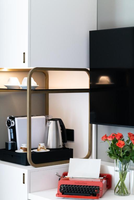 Kuchyň nebo kuchyňský kout v ubytování 3T Boutique Hotel