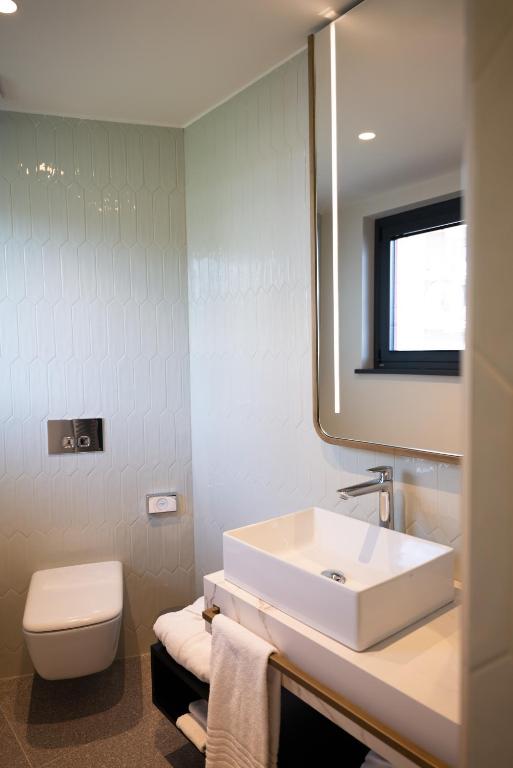 Koupelna v ubytování 3T Boutique Hotel