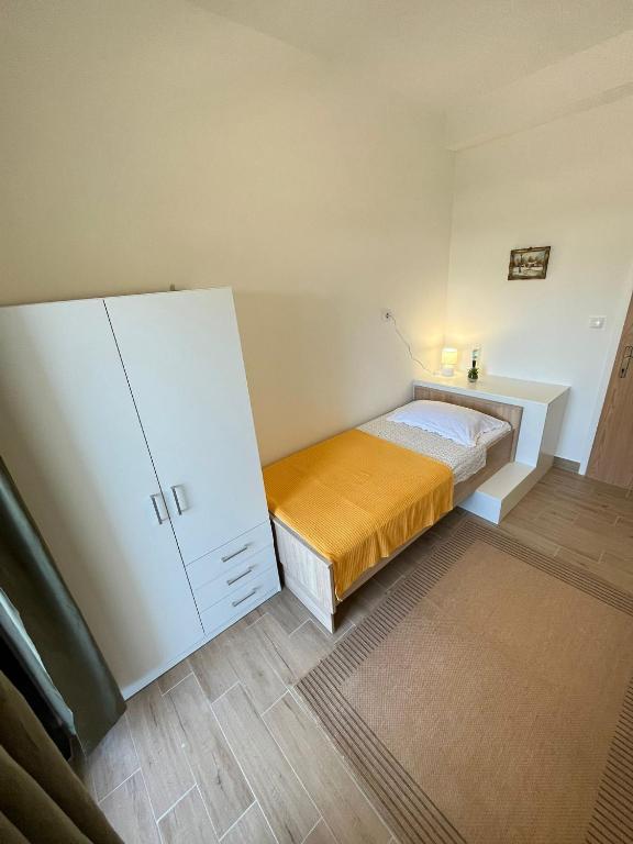 Posteľ alebo postele v izbe v ubytovaní Apartman Maša