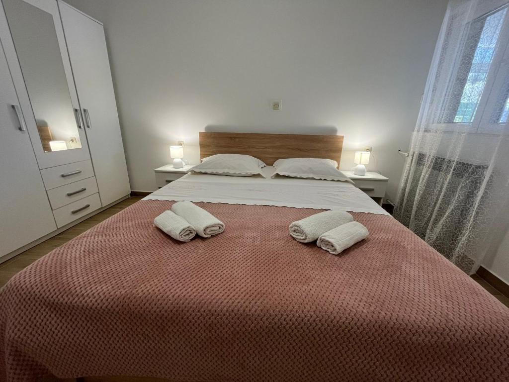Posteľ alebo postele v izbe v ubytovaní Apartman Maša