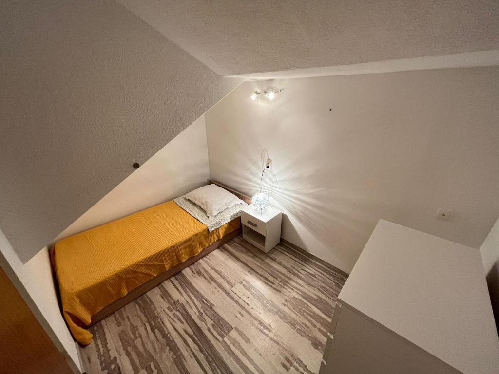Posteľ alebo postele v izbe v ubytovaní Apartman Maša