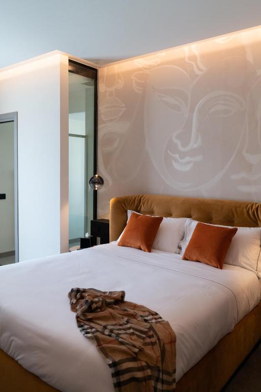 Postel nebo postele na pokoji v ubytování 3T Boutique Hotel