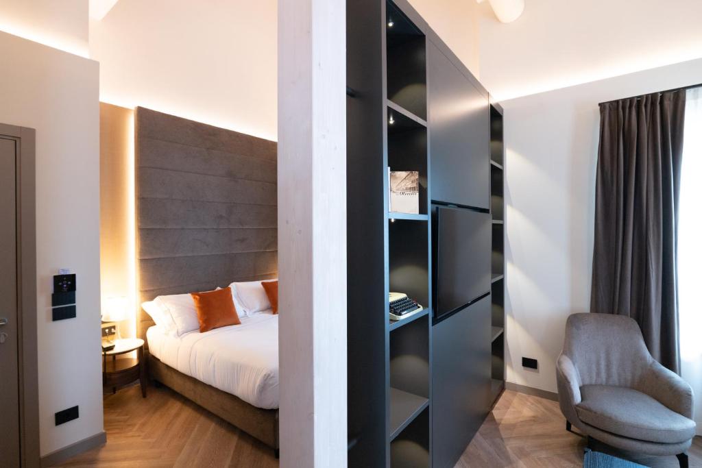 Postel nebo postele na pokoji v ubytování 3T Boutique Hotel