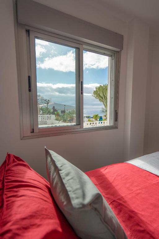 Postel nebo postele na pokoji v ubytování Luxurious apartment with large terrace and sea views