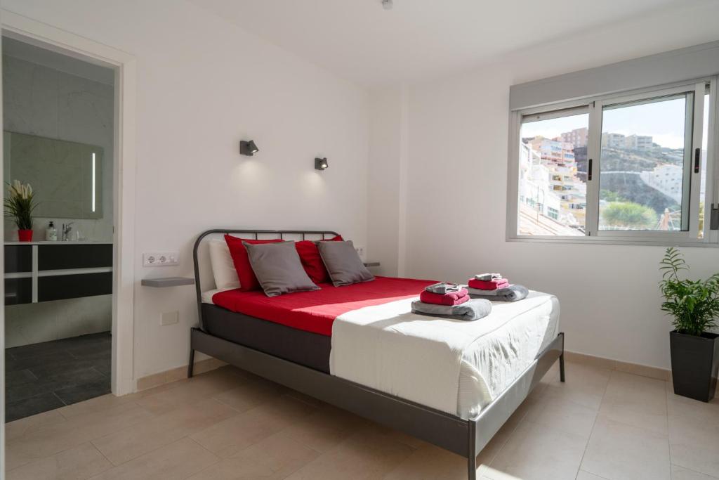 Postel nebo postele na pokoji v ubytování Luxurious apartment with large terrace and sea views