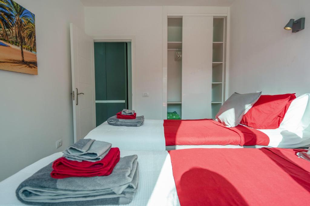 Postel nebo postele na pokoji v ubytování Luxurious apartment with large terrace and sea views