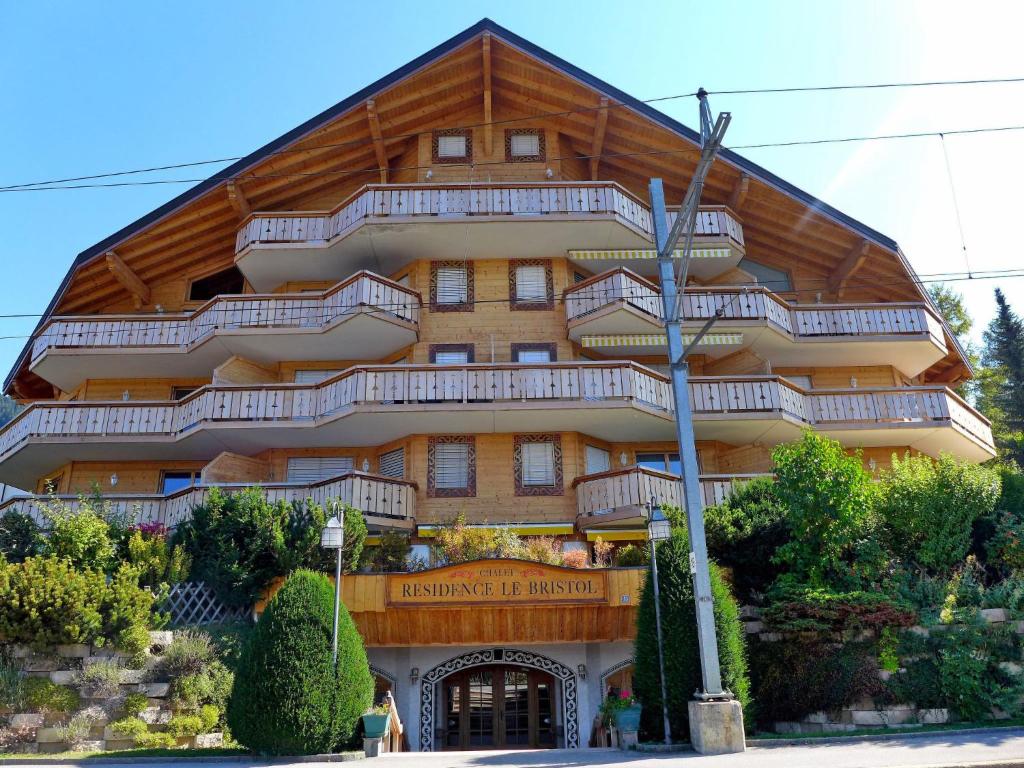 a large building with balconies on the side of it at Apartment Résidence Bristol 4 by Interhome in Villars-sur-Ollon