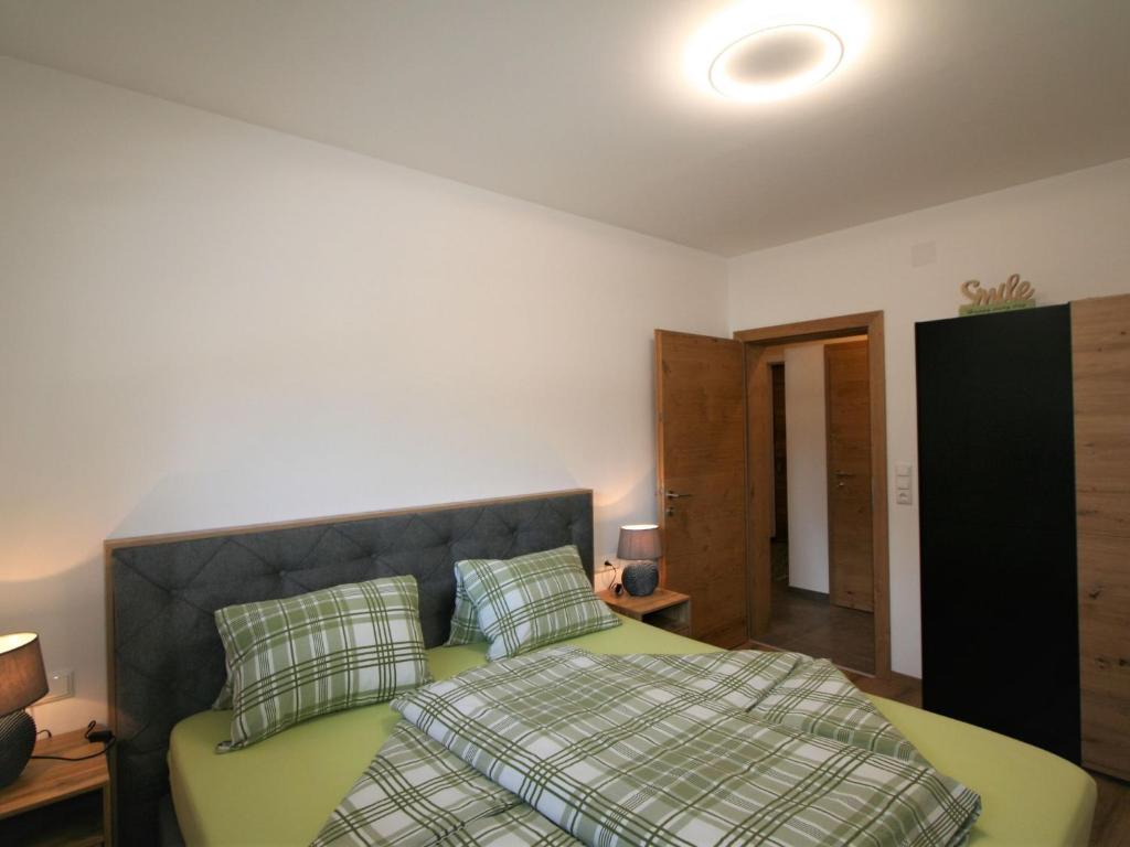 Postel nebo postele na pokoji v ubytování Apartment Haus Sonja by Interhome