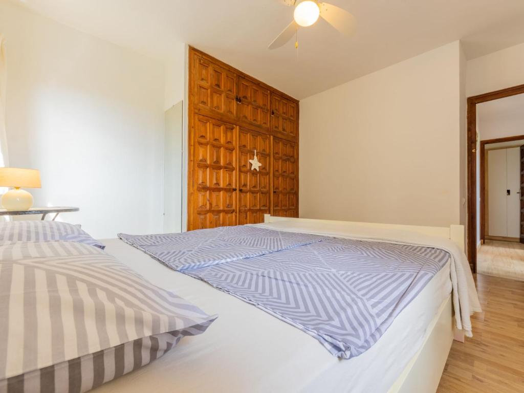 Postel nebo postele na pokoji v ubytování Holiday Home Rossi by Interhome