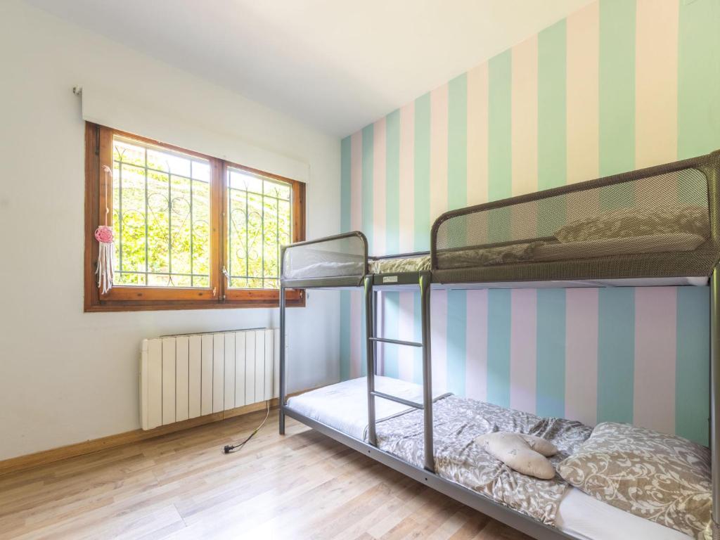 Postel nebo postele na pokoji v ubytování Holiday Home Rossi by Interhome