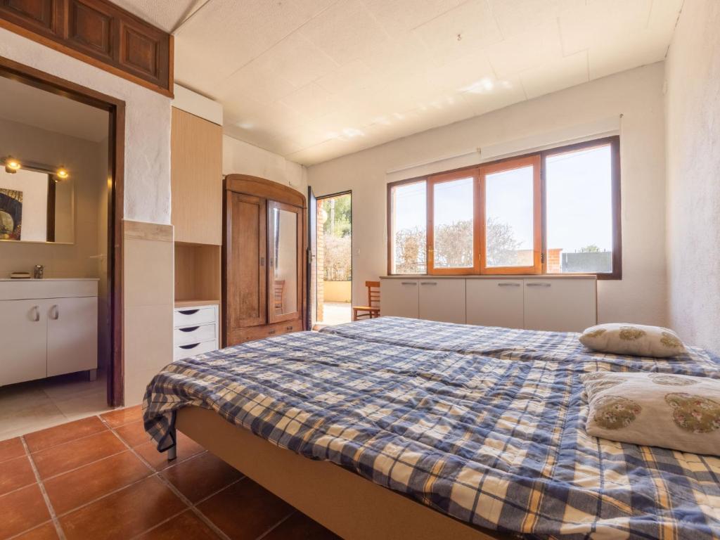 Postel nebo postele na pokoji v ubytování Holiday Home Rossi by Interhome