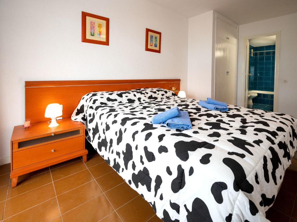 Postel nebo postele na pokoji v ubytování Apartment Osuna by Interhome