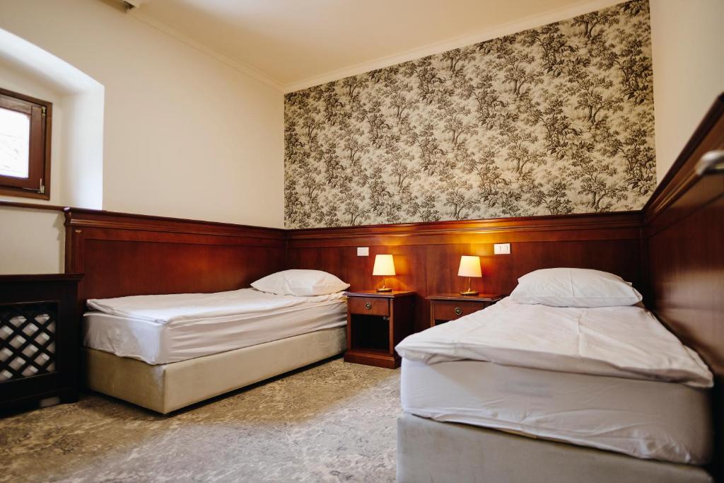 Postel nebo postele na pokoji v ubytování Mokrice Castle Estate