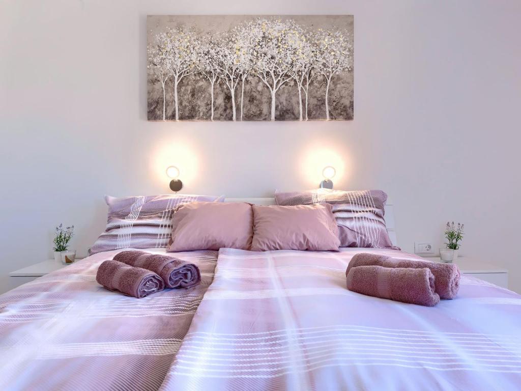 Posteľ alebo postele v izbe v ubytovaní Apartment Joy by Interhome