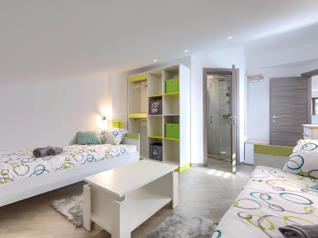 Posteľ alebo postele v izbe v ubytovaní Apartment Joy by Interhome