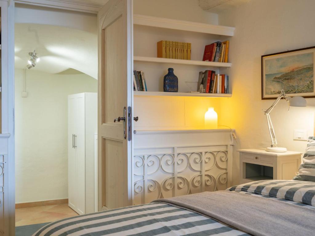 Posteľ alebo postele v izbe v ubytovaní Apartment Al Monastero by Interhome