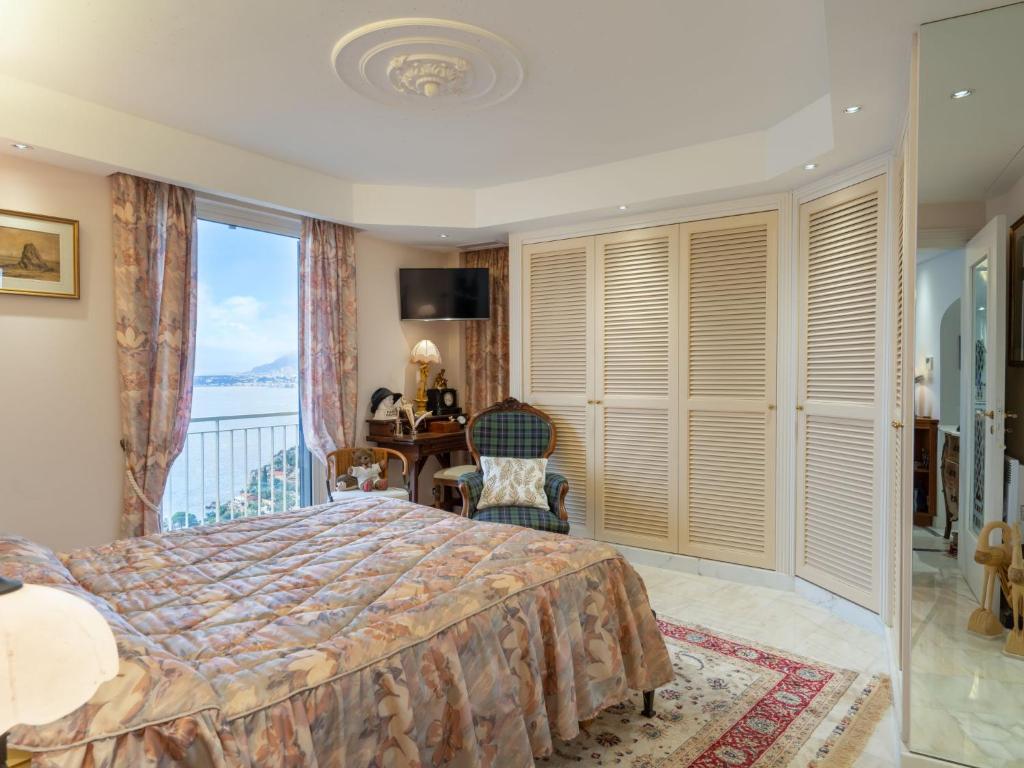 A bed or beds in a room at Apartment Grimaldi by Interhome