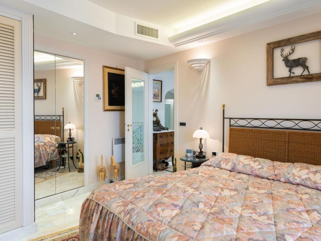 A bed or beds in a room at Apartment Grimaldi by Interhome
